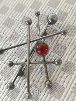 Denmark sterling silver NE FROM stone pin abstract atomic modernist signed