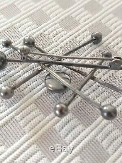 Denmark sterling silver NE FROM stone pin abstract atomic modernist signed