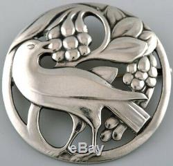 Early Georg Jensen brooch in sterling silver. Bird motif and grapes
