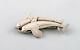 Sterling silver brooch by Georg Jensen. Design number 311. Two dolphins